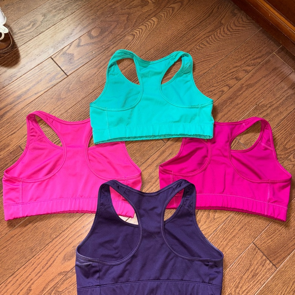 Nike Dri-FIT Sports Bras in Pink, Teal, and Purple - Picture 2 of 2